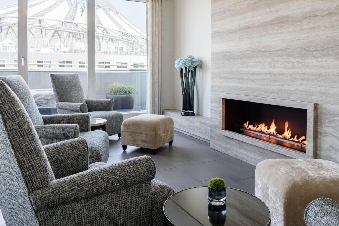 The Mandala Berlin, A Member Of Design Hotels ภายนอก รูปภาพ A fireplace in a living room