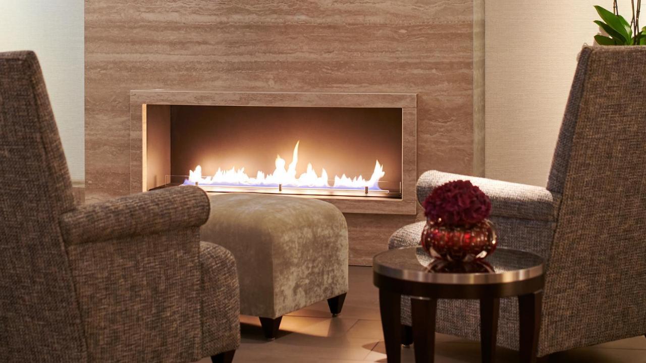 The Mandala Berlin, A Member Of Design Hotels ภายนอก รูปภาพ A fireplace in a home